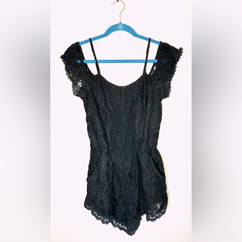 Black crocheted Romper With Pockets!